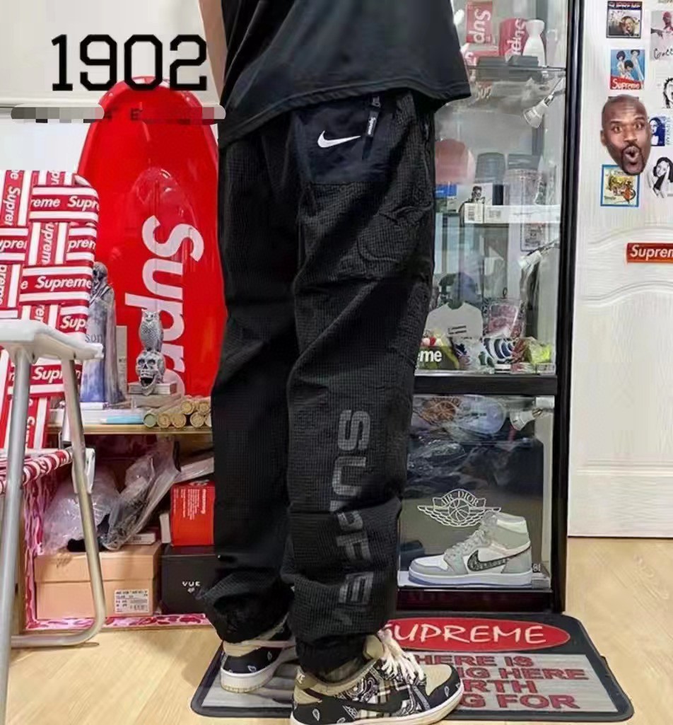 NIKE x SUPREME jewel-appliquéd reversible trousers pants